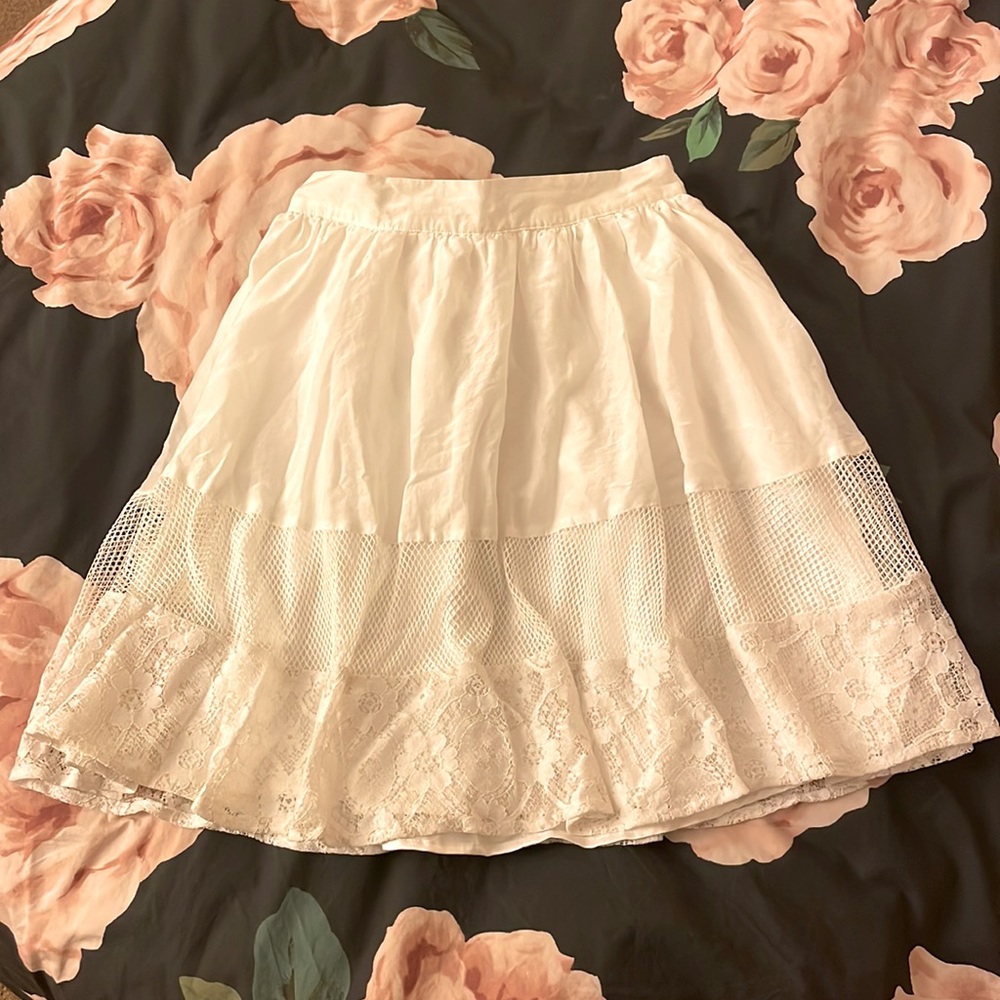 BEBE Ruffled skirt with floral and knit details